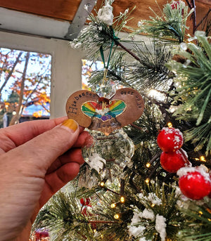 "His banner over us is love" -  rainbow heart angel ornament/suncatcher